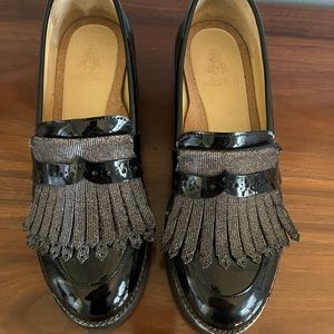 The Office of Angela Scott black patten leather